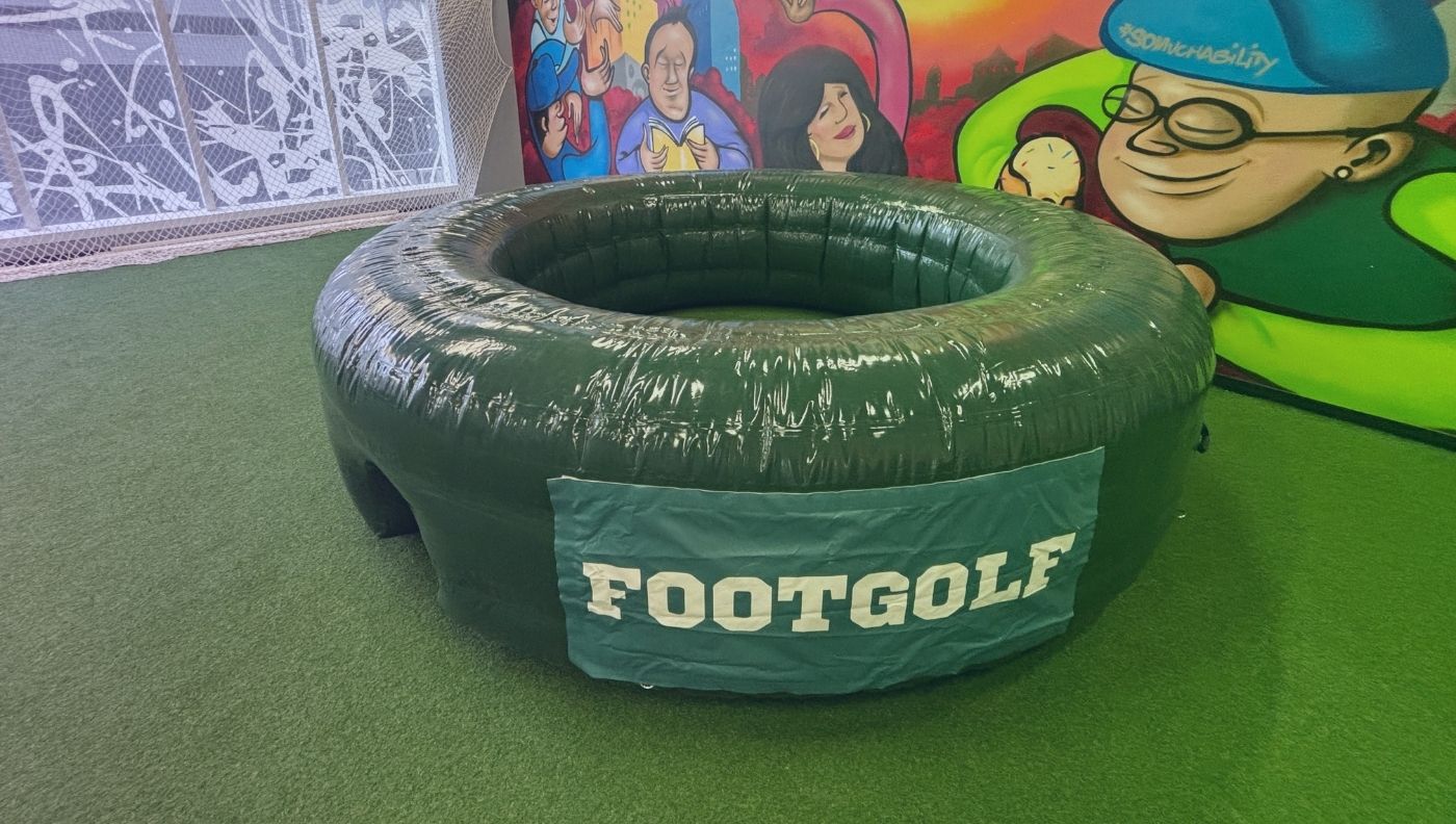 Participants will try to land their football in the giant hole using the fewest kicks, similar to traditional footgolf.
